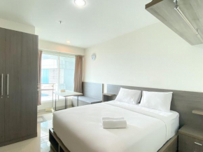 Enjoy Living Studio Room at High Floor Grand Kamala Lagoon Apartment By Travelio